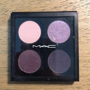 3 MAC eyeshadow palettes.